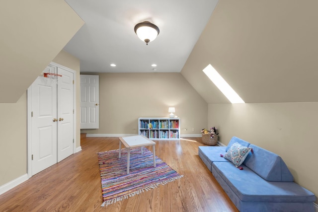 569 Prairie Ave, Glen Ellyn, IL 60137 - bonus room with a skylight, light wood finished floors, baseboards, lofted ceiling, and recessed lighting
