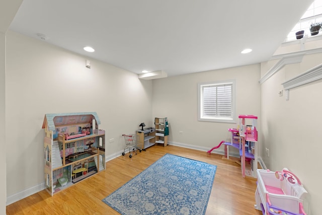 569 Prairie Ave, Glen Ellyn, IL 60137 - playroom with plenty of natural light, wood finished floors, baseboards, and recessed lighting