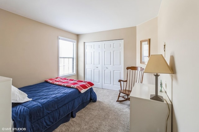 carpeted bedroom with a closet