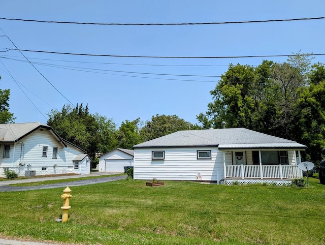 1514 173rd St, East Hazel Crest, IL 60429 - view of front of house with a porch, a front lawn, central AC unit, and a garage