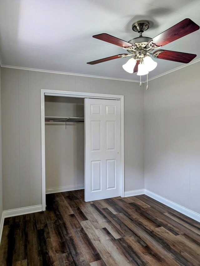 1514 173rd St, East Hazel Crest, IL 60429 - unfurnished bedroom featuring crown molding, wood finished floors, baseboards, a closet, and a ceiling fan