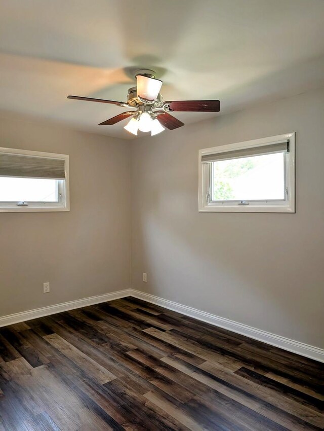 1514 173rd St, East Hazel Crest, IL 60429 - unfurnished room with healthy amount of natural light, ceiling fan, baseboards, and dark wood finished floors