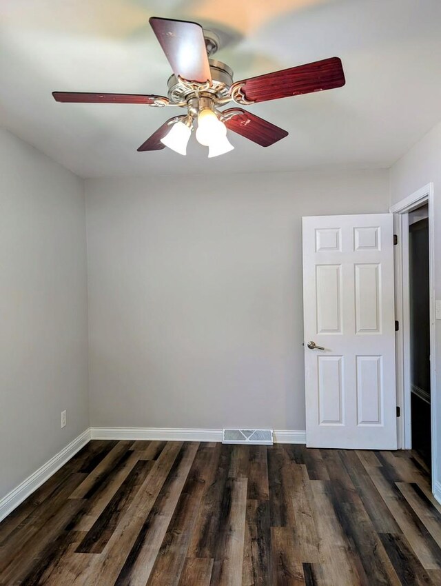 1514 173rd St, East Hazel Crest, IL 60429 - spare room featuring a ceiling fan, baseboards, and dark wood finished floors