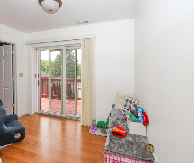 interior space featuring visible vents and light wood-type flooring