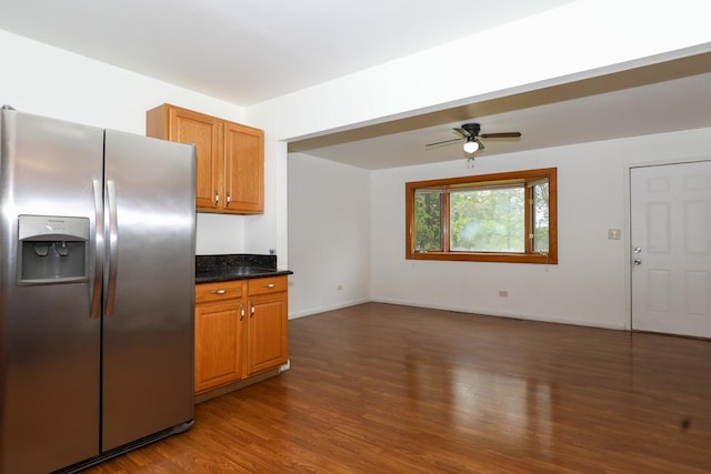 18557 W Country Ln, Grayslake, IL 60030 - kitchen with stainless steel fridge, dark wood-type flooring, ceiling fan, and brown cabinets