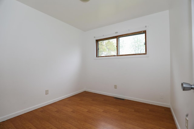 18557 W Country Ln, Grayslake, IL 60030 - unfurnished room with baseboards and light wood-style floors