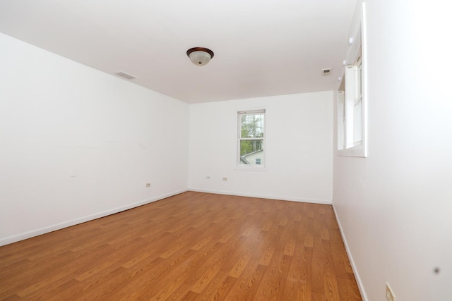 18557 W Country Ln, Grayslake, IL 60030 - empty room with light wood-type flooring and baseboards