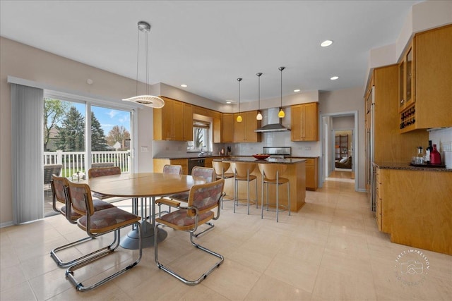 dining space with recessed lighting