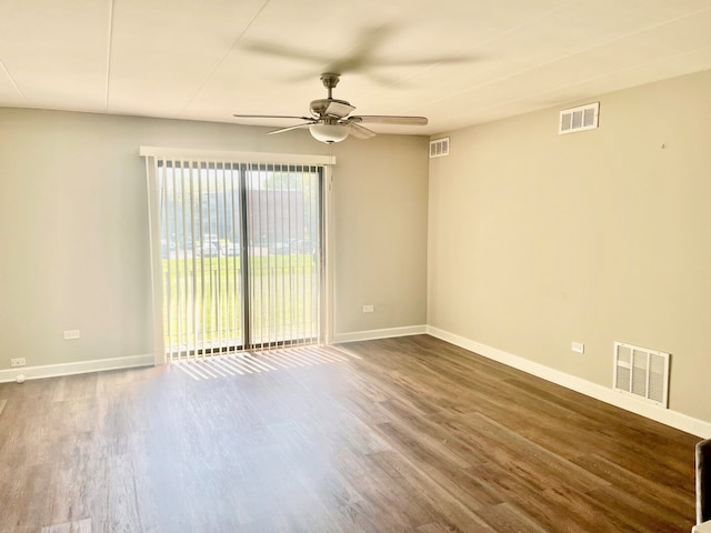 2237 175th St Unit 2B, Lansing, IL 60438 - empty room with a ceiling fan, wood finished floors, and baseboards