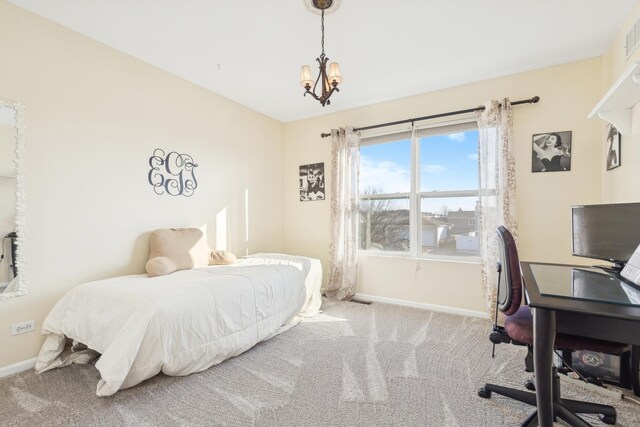 2851 Briarcliff Ln, Lake In The Hills, IL 60156 - bedroom with baseboards, a chandelier, and carpet floors