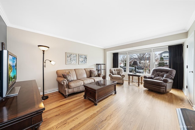 living area featuring ornamental molding, light wood-type flooring, baseboards, and a baseboard heating unit