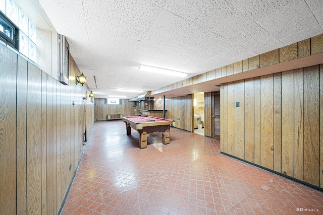 rec room featuring wood walls and pool table