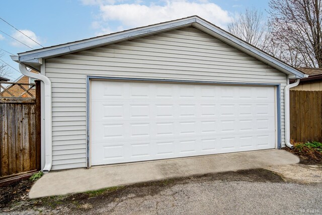 detached garage with fence