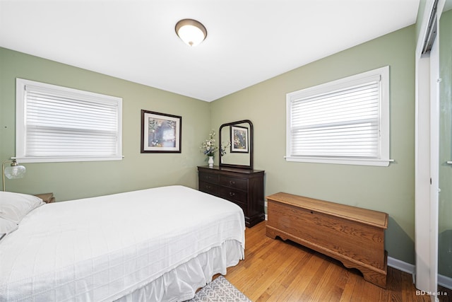 bedroom featuring wood finished floors