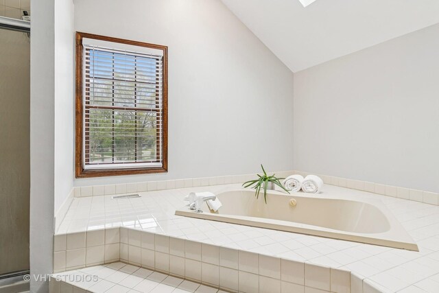 carpeted bedroom with visible vents and a ceiling fan