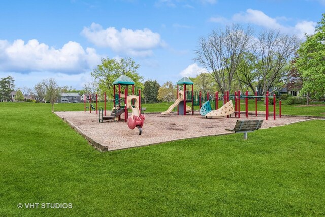 community play area with a lawn