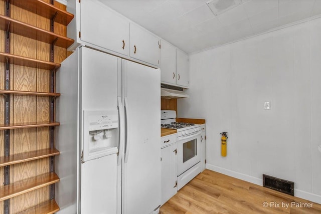 502 Everett Ave, Crystal Lake, IL 60014 - kitchen with white appliances, open shelves, light wood-style flooring, under cabinet range hood, and white cabinets