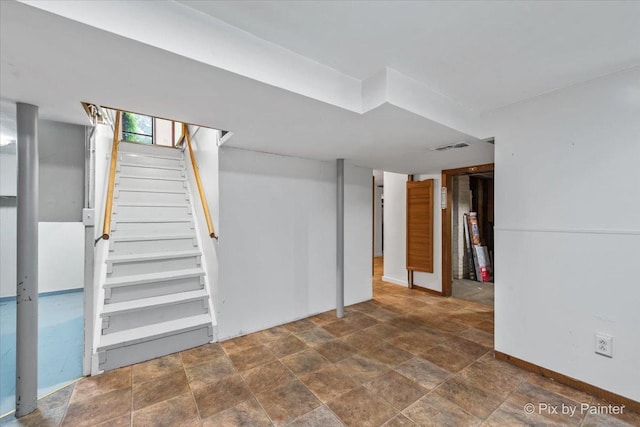 502 Everett Ave, Crystal Lake, IL 60014 - finished below grade area featuring stairway and stone finish flooring