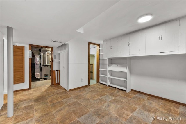 502 Everett Ave, Crystal Lake, IL 60014 - finished basement with baseboards and stone finish floors