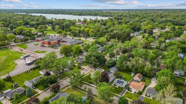 502 Everett Ave, Crystal Lake, IL 60014 - aerial view of property and surrounding area with a nearby body of water, a heavily wooded area, and nearby suburban area