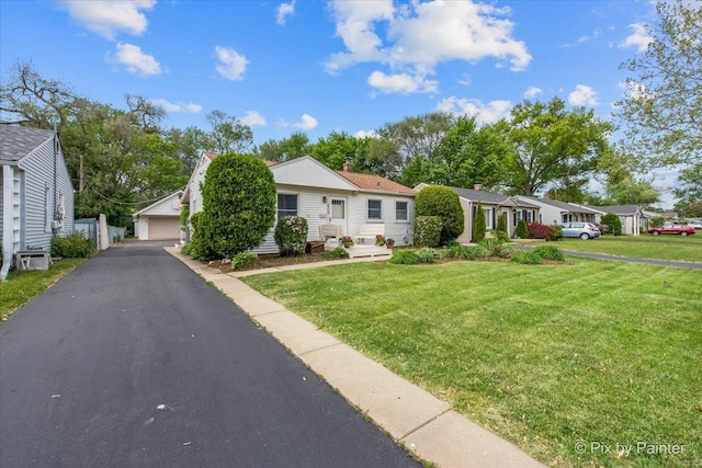 502 Everett Ave, Crystal Lake, IL 60014 - view of front of home with a front lawn and a detached garage