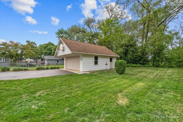502 Everett Ave, Crystal Lake, IL 60014 - view of home's exterior with a detached garage and an outdoor structure