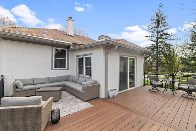 wooden deck with an outdoor hangout area