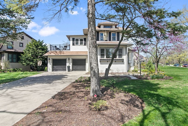 view of front of house featuring driveway, a front yard, a garage, a balcony, and stucco siding
