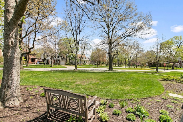 surrounding community with a lawn