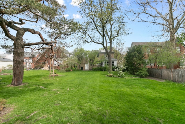 view of yard with fence