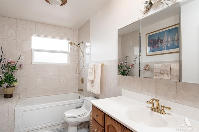 full bath featuring shower / tub combination, vanity, toilet, and tile walls