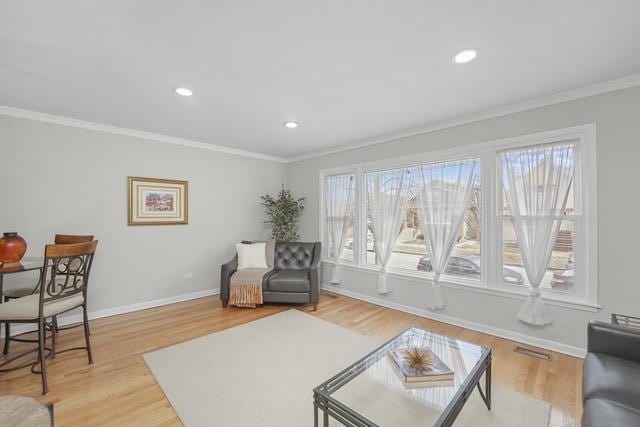 2716 N 73rd Ave, Elmwood Park, IL 60707 - living area with recessed lighting, light wood-type flooring, baseboards, and ornamental molding