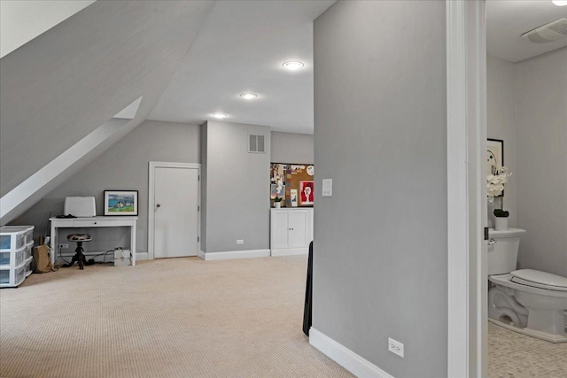 additional living space featuring baseboards, carpet, recessed lighting, and visible vents