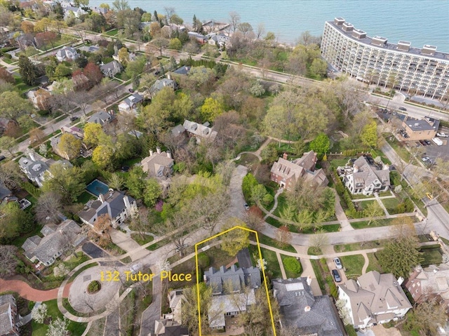 bird's eye view with a water view and a residential view