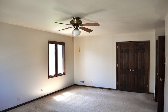 1272 N Scarlet Dr, Addison, IL 60101 - empty room featuring light carpet, a ceiling fan, and baseboards