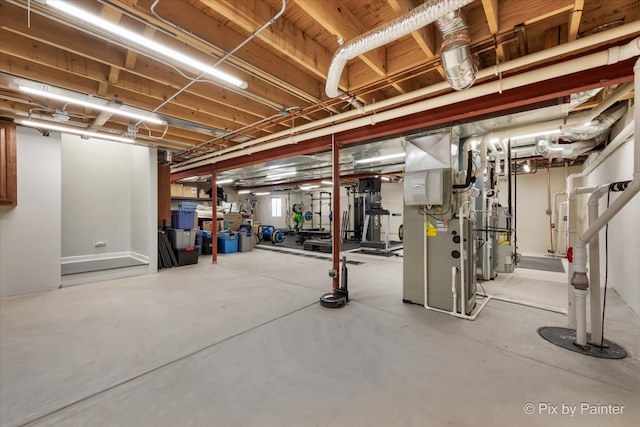 basement featuring heating unit
