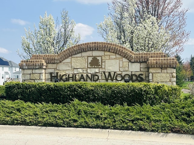 view of community sign
