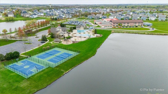 aerial view with a water view and a residential view
