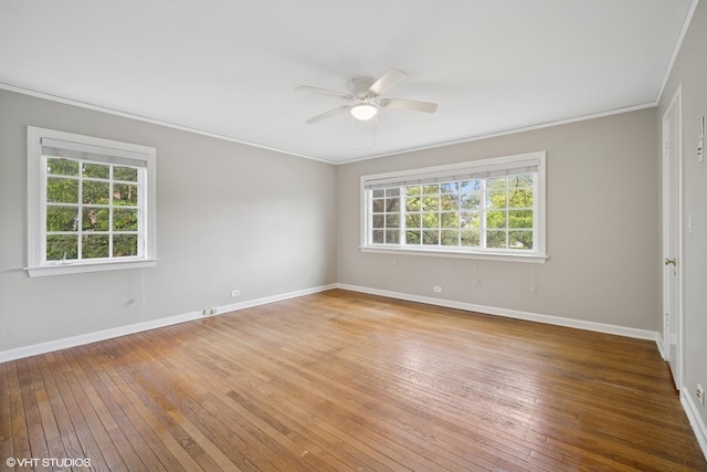 444 Winnetka Ave, Winnetka, IL 60093 - unfurnished room with hardwood / wood-style floors, ornamental molding, ceiling fan, and baseboards