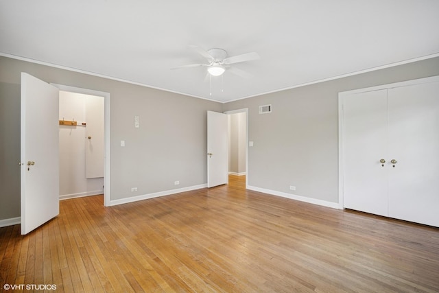 444 Winnetka Ave, Winnetka, IL 60093 - spare room with a ceiling fan, light wood-type flooring, baseboards, and ornamental molding