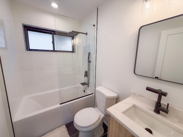 bathroom with vanity, toilet, recessed lighting, and bathtub / shower combination