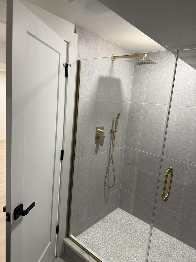 bathroom featuring a stall shower