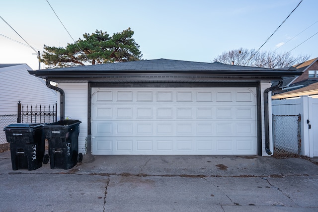 detached garage with fence