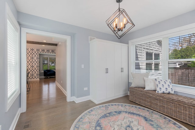 1137 Griffith Rd, Lake Forest, IL 60045 - living area with a chandelier, baseboards, and wood finished floors