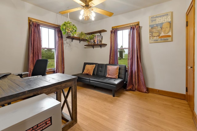 13459 N Tower Rd N, Lee, IL 60530 - office space with light wood finished floors, a ceiling fan, healthy amount of natural light, and baseboards