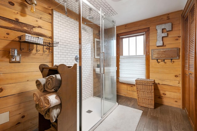 13459 N Tower Rd N, Lee, IL 60530 - bathroom with a stall shower, wood finished floors, and wooden walls