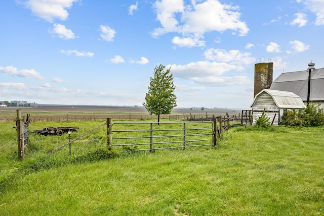 13459 N Tower Rd N, Lee, IL 60530 - view of yard with a barn, a view of rural / pastoral area, and an outbuilding