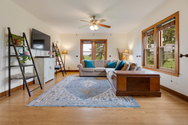 13459 N Tower Rd N, Lee, IL 60530 - living room with baseboards, ceiling fan, and wood finished floors