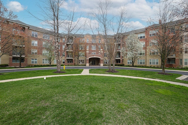 view of community with a yard