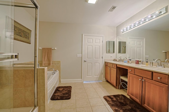 full bath featuring a bath, tile patterned flooring, a sink, and a shower with shower door
